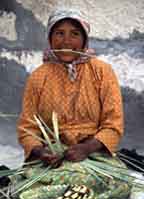 In Mexico's Copper Canyon, a young Tarahumara weaver modestly smiles.